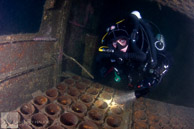In the Ship's Magazine / San Diego, California: Diver in the ship's magazine, HMCS Yukon
